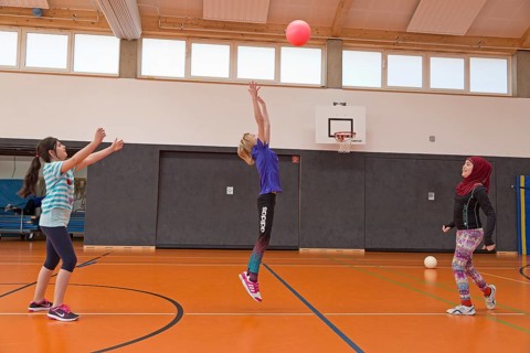 Students playing ball in the gym