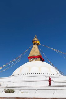 Monk at Buddhist stupa