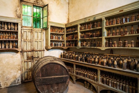 Showroom with old dust covered sherry bottles