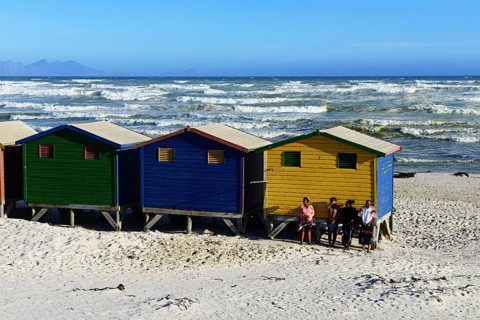 Colorful beach cottages on the sandy beach