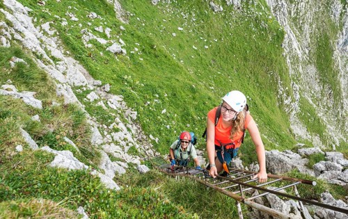 Hikers on via ferrata