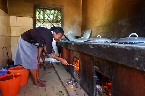 Woman in school kitchen