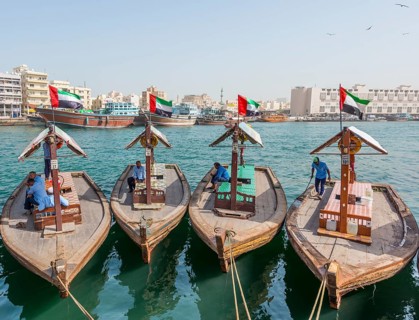 Small traditional ships on the Creek