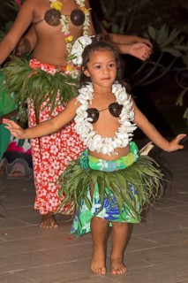 Little girl decorated with flowers