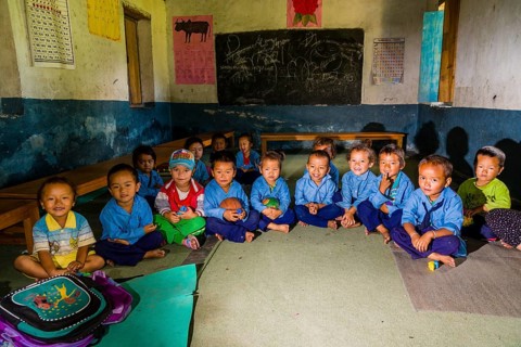 Group of children in blue dresses