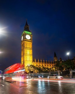 Red double-decker bus in front of Big Ben