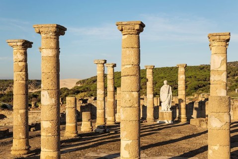 Ruins with statue of emperor Trajano