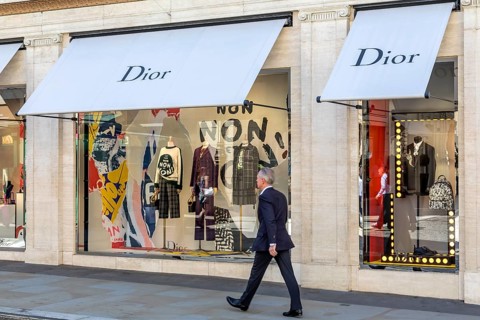 Passer-by in front of shop window