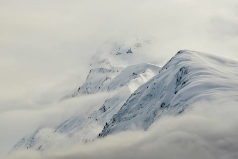 Mountains with snow and clouds