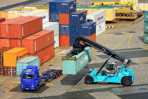 Container loaded onto a truck