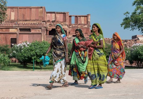 Indian women in traditional colorful sari dresses