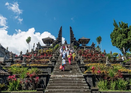 Devout Balinese descend stairs