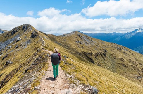 Female hiker on Kepler Track