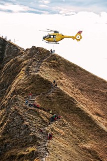 Mountain rescue by helicopter on the Fellhorn ridge