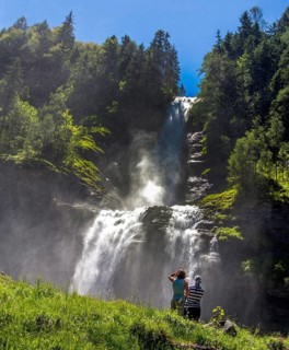 Two women in front of Rouget waterfall