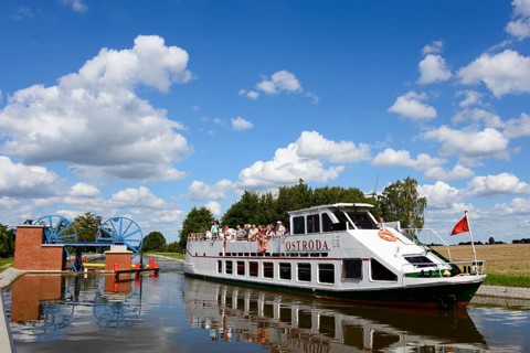 Ship Ostroda at a lock in the Oberlandkanal