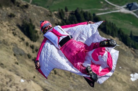 Base jumper flying with wingsuit in the air