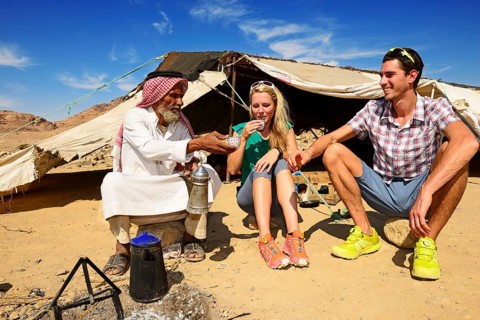 Bedouin preparing coffee with pan-roasted beans and kardamom