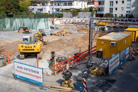 Construction site for a new residential building with condominiums and penthouses