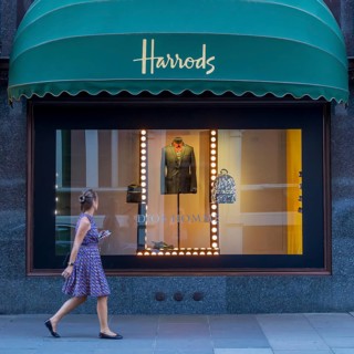 Passer-by in front of a shop window