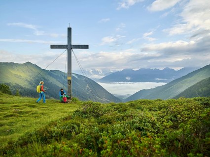 Hikers at summit cross