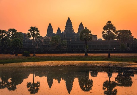 Temple complex of Angkor Wat reflected in the water basin