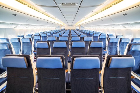 Interior of big airplane with seats
