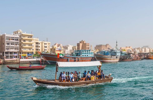 Small traditional ships and old dhow on the creek