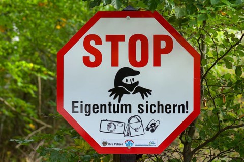 Warning sign for thieves in the forest area of Ahrenshoop