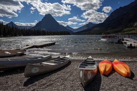 Canoes on the shore of Two Medicine Lake
