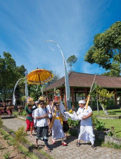 Procession of devout Buddhists with offerings