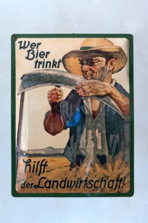 Vintage advertising sign made of sheet metal