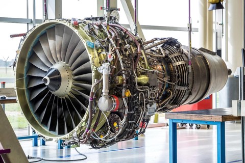 Engine's maintenance in huge industrial hall