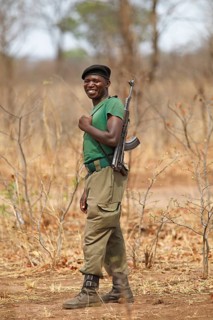 Gamekeeper with gun