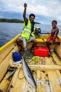 Fisherman in a boat while fishing