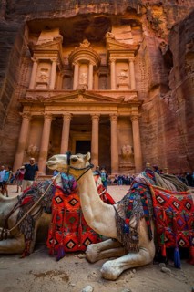 Dromedaries in front of the Pharaoh's treasure house carved out of rock