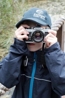 Child photographed with reflex camera