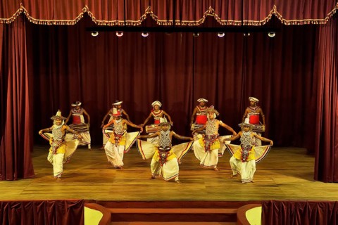 Drummers and dancers at a performance of Kandy dancers