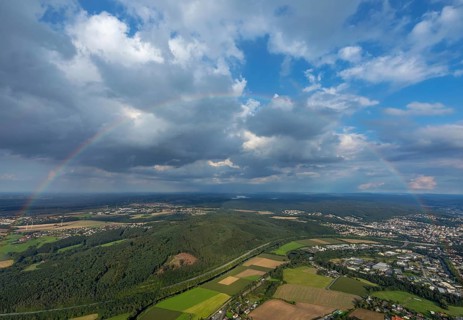 Cloud sky with rainbow over Neheim-Husten