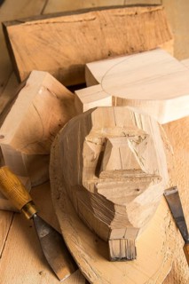 Steps from wooden block to wooden mask