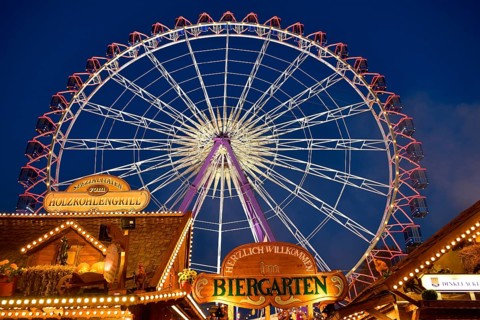 Beer garden in front of ferris wheel