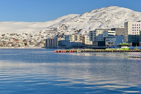 Snow-white bay with residential buildings
