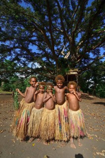 Native children with bast skirts