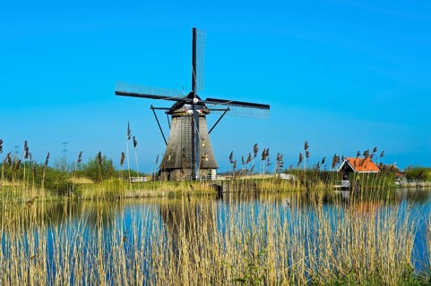 Dutch windmill over a canal