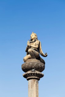 Golden statue of Garuda on a column