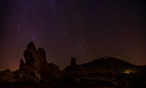 Roque Cinchado and Teide vulcano with starry sky