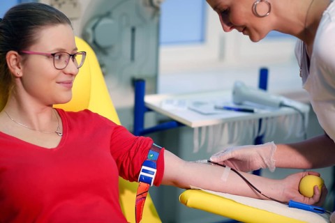 Patient taking a blood sample at the transfusion ward of a hospital
