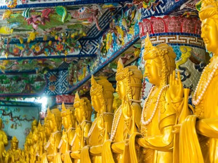 Golden standing Buddha statues