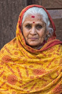 Nepalese woman with nose jewelry and headscarf