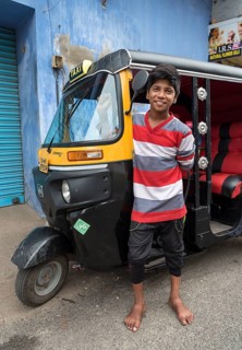 Boy with autorickshaw